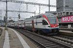 RABe 511 002 KISS verlässt am 12.02.2024 den Bahnhof Brugg.