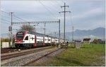 RE 5074 Chur - Zürich mit 511 036 in Siebnen-Wangen.