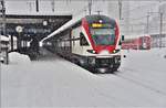 RE5073 mit 511 020 in Landquart. (14.01.2017)