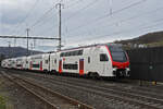 RABe 512 016-2 KISS durchfährt am 26.02.2024 den Bahnhof Gelterkinden.