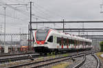 RABe 521 029, auf der S3, fährt bei regnerischem Wetter zum Bahnhof Muttenz.