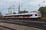 RABe 521 011 steht am 26.09.2022 auf einem Nebengleis beim badischen Bahnhof.