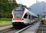 SBB - Triebzug RABe 521 022 unterwegs auf der S3 nach Brunnen im Bahnhof von Meggen am 09.08.2014