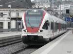 SBB - Triebzug RABe 523 017 bei der ausfahrt aus dem Bahnhof Montreux am 24.11.2012