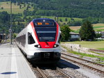 SBB - Triebzug RABe 523 050 bei der einfahrt im Bahnhof Glovelier am 09.07.2016