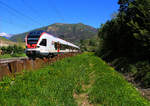 An der alten Ceneri-Strecke Bellinzona-Lugano in Mezzovico (wird bald durch einen Basistunnel ersetzt): Eilzug nach Milano Centrale mit SBB/Trenord Flirt 524 105 von Bellinzona aus.