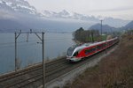 Von Sargans kommend fährt RABe 526 048-4 als S4 23445 am Walensee entlang nach Uznach. Aufnahme entstand am 28.02.2016 bei Mols.