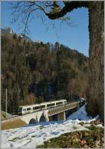 Ein Lötschberger als Regionalzug 6222 Zweisimmen - Spiez - Bern auf der 135 Meter langen Bunschenbachbrücke bei Weissenburg.