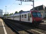 RBDe 561 174 mit  normalem  AB als S6 21641 im Bahnhof Langenthal, 11.09.2010.