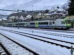 BLS RBDe 566 '' 238 der ab heute als RegioExpress nach Zweisimmen fährt, 12.12.21 beim Bahnhof Spiez.