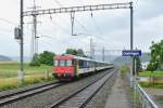 RBe 540 016-3 mit dem Leermaterialzug via Wrenlos-Killwangen nach Zrich, 09.07.2014.