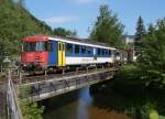 OeBB: Auch noch am 14. Juli 2015 warten die ehemaligen SBB Triebfahrzeuge RBe 540 und BDe 4/4 651 in der Klus bei Balsthal auf die Verschrottung. 
Foto: Walter Ruetsch