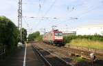 Ein Nachschuss von der 185 597-2  von Crossrail  fährt als Lokzug aus Aachen-West nach Herzogenrath und fährt durch Kohlscheid und fährt in Richtung Herzogenrath.
An einem schönem Sommerarbend vom 29.6.2015.