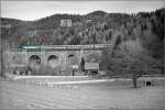 semmeringbahn 1016 023 'Kyoto' f�hrt mit IC 250 �ber das Untere Adlitzgraben Viadukt am Semmering. 08.12.2009