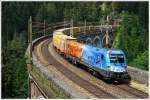 semmeringbahn 1116 250 'Feuerwehr' f�hrt mit dem Hackschnitzelzug 41680 �ber das Kalte Rinne Viadukt nahe Breitenstein. 
3.7.2010