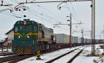 S 664-108 mit Containerzug aus Hodo fhrt in Bahnhof Pragersko ein.