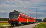 SŽ 814-123 fährt durch Cirkovce-Polje Richtung Maribor HBF. /23.9.2015