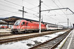 SŽ 541 110-7 wartet in Villach Hbf, mit dem D 211  Sava  (Villach Hbf - Ljubljana - Zagreb Glavni kol. - Vinkovci), auf die Abfahrt.
Aufgenommen am 4.3.2019.