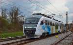 SŽ 312-012 fährt durch Maribor-Tabor Richtung Maribor Hauptbahnhof. /24.3.2014