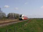 stadler-gtw Arriva D-GTW 2/8 10322 mit Regionalzug 37746 Delfzijl-Groningen bei Delfzijl am 16-4-2010.