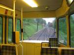 stadtbahn-karlsruhe-hier-nur-die-s-bahnen Ein Blick durch das hintere Fenster des Tw 561. Das Bild machte ich auf der S1 Bad Herrenalb - Karlsruhe. Im Hintergrund kann man den Bahnhof von Frauenalb-Schielberg gut erkennen. Die Aufnahme entstand am 15.05.2010 um 7 Uhr in der Fr�he und in einem fast leeren Zug.