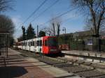 stadtbahn-koln-hochflurstadtbahnen-b-wagen-und-k5000 TW 2207 bei der Ausfahrt am 18. M�rz 2010 mit einem weiteren unbekannten Wagen an der Haltestelle 'Maria-Himmelfahrt-Stra�e'. Der Zug war als Linie 18 mit Ziel Klettenberg unterwegs.