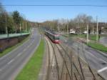 stadtbahn-koln-hochflurstadtbahnen-b-wagen-und-k5000 2 unbekannt gebliebene Wagen aus der Serie K5000 konnten am 06. April 2010 unterwegs als Linie 4 Richtung Schlebusch von der Fu�g�ngerbr�cke der Haltestelle 'Stegerwaldsiedlung' von mir fotografiert werden.