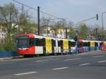 stadtbahn-koln-hochflurstadtbahnen-b-wagen-und-k5000 TW 5141 und TW 51?? konnte ich am 12. April 2010 unterwegs als Linie 4 bei der Ausfahrt aus der Haltestelle 'Im Weidenbruch' fotografieren.