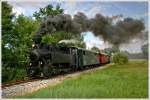 stainzerbahn 764.411R (ehemalige rum�nische Waldbahnlokomotive) des Stainzer Flascherlzuges bei der Ausfahrt aus Preding.  18.07.2010