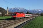 1016 030 mit OEC 961 am 09.04.2011 vor dem Kloster Reisach bei Niederaudorf.