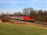 Die 1016 049 mit derm EC 112 am 28.12.2011 unterwegs bei Hilperting.