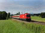 Die 1016 018 mit einem Nachtzug nach Mnchen am 23.06.2012 unterwegs bei Hilperting.