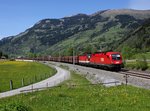 Die 1016 032 und die 1144 248 mit einem Erzzug am 21.05.2016 unterwegs bei Dorfgastein.