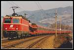 1044 094 zieht am 28.02.2000 IC668 (Graz - Bregenz) kurz nach Bruck an der Mur durchs Murtal. Als erster Wagen ist der Autotransportwagen gereiht der bis Feldkirch am Zug bleibt.