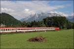 1116 170 bringt vor dem Wilden Kaiser den OEC 566  STADT INNSBRUCK  von Wien Westbahnhof nach Bregenz.