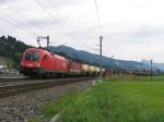 1116 029-8 und eine 1144 mit einem Gterzug in die Richtung Wrgl bei Brixen im Thale am 11-8-2010.
