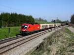 Die 1116 170 mit einem Güterzug am 16.04.2011 unterwegs bei Vogl.