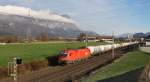 1116 136-3 der ÖBB ist am 10.12.2014 mit einem Kesselzug von GATX durch das Unterinntal unterwegs.