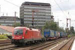 ÖBB 1116 065 mit einem Lkw Auflieger in Düsseldorf Rath, am 15.07.2016.