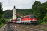1142 632 mit einem REX nach Passau Hbf am 14.07.2012 bei der Ausfahrt in Wernstein am Inn.