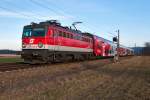 1142 698 ist mit REX 2170 auf der Franz Josefs Bahn unterwegs. Die Aufnahme entstand am 13.02.2014 kurz vor Muckendorf-Wipfing.