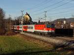 Die 1144 036 mit einem REX am 06.01.2018 unterwegs bei Elsbethen.