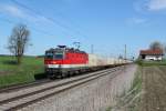 1144 252 mit einem Containerzug am 19.04.2012 bei Hilperting.