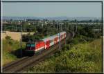 1144 274 schiebt am 15.7.2006 eine CityShuttle Garnitur Richtung Wien.