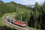 1144.023 fährt mit EC-151 vor der Kulisse der Rax am 30.7.16 bei Breitenstein richtung Semmering.