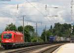 1216 021-6 und 1044 101-2 mit einer RoLa gen Innsbruck bei der Druchfahrt Brixlegg am 23.5.08
