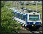 4020 246 bei der Einfahrt in Wien-Liesing als S-Bahn nach Wiener Neustadt am 19.6.2006.