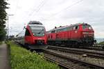 Ausfahrt am 12.08.2016 von ÖBB 4024 098-8 als S1 (Lindau Hbf - Bludenz) aus dem Startbahnhof, als nebenan die 218 434-9 zusammen mit 218 499-2 auf dem Bahndamm in Lindau standen.