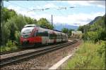 4024 080 fhrt am Morgen des 27.06.07, als RB 5108 von Innsbruck nach Rosenheim, aus dem Bahnhof Brannenburg.