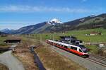 4024 003-7 als REX 1513 (Wörgl Hbf - Schwarzach-St. Veit) bei Kirchberg in Tirol (Bockern), 10.04.2023.